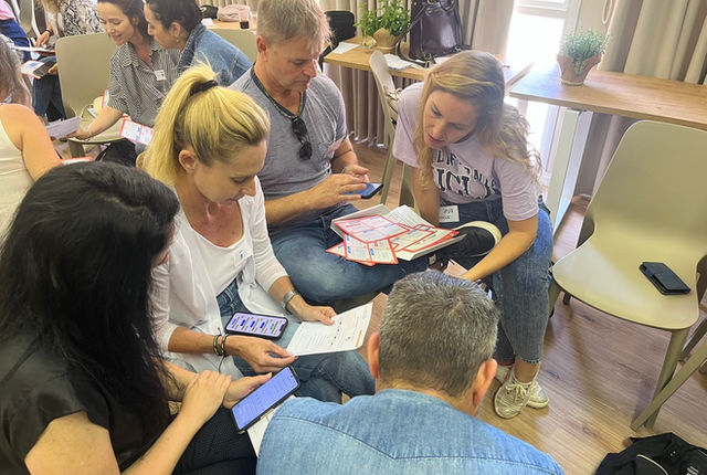 Teams working around the table